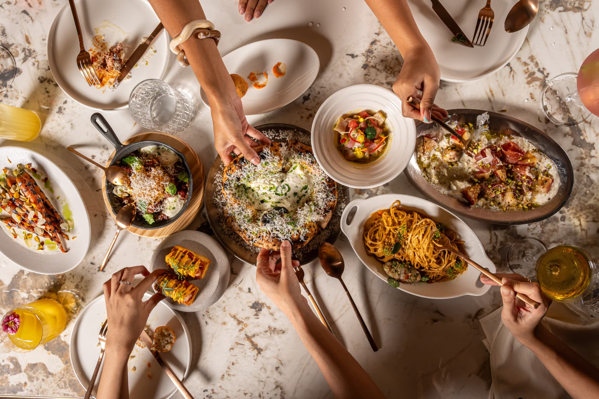 A table at SOL9 filled with sharing dishes